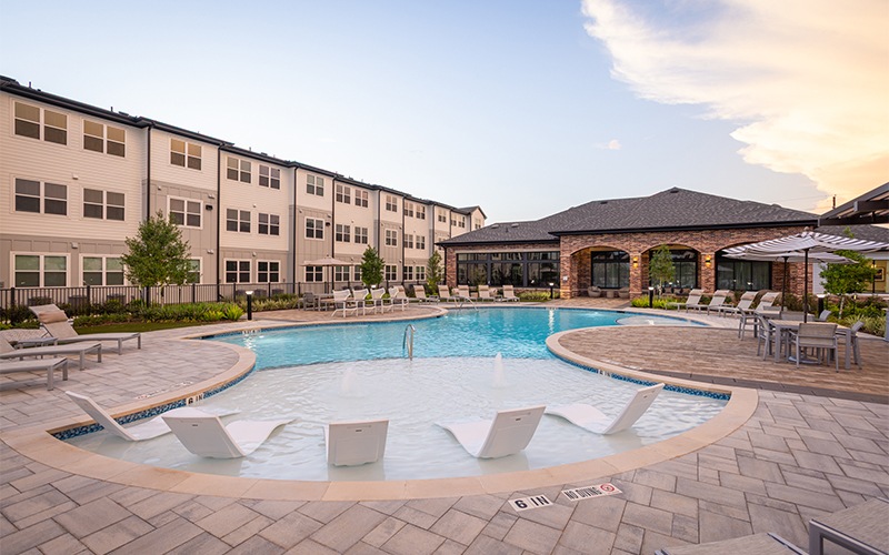 pool with ample seating surrounding it