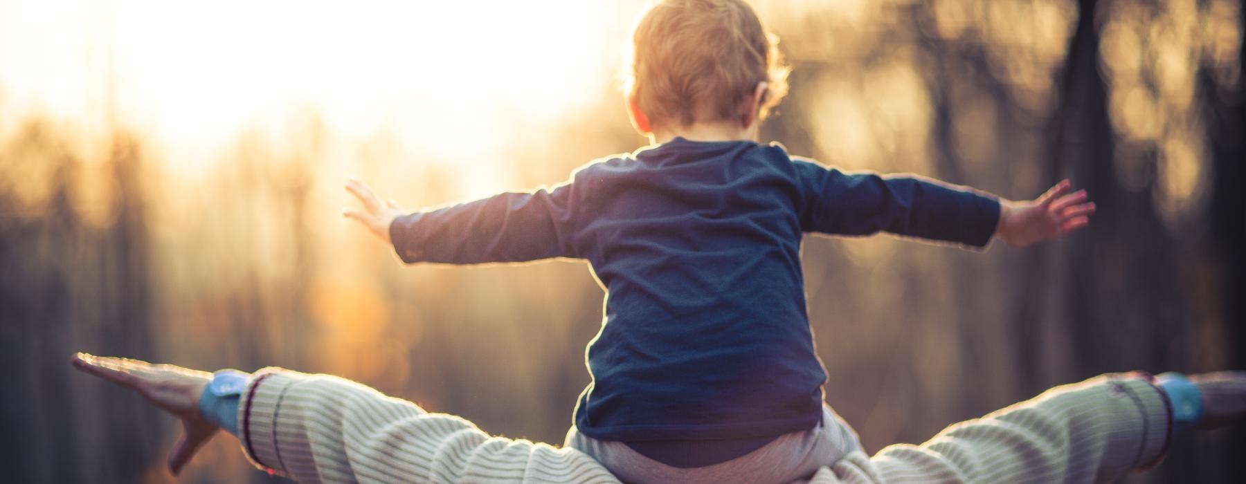 a baby on a person's back