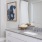 a bathroom with a marble countertop