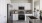 a kitchen with white cabinets