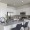 kitchen with ample counter-space, modern appliances and bright lighting