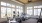 a room with exercise equipment and windows